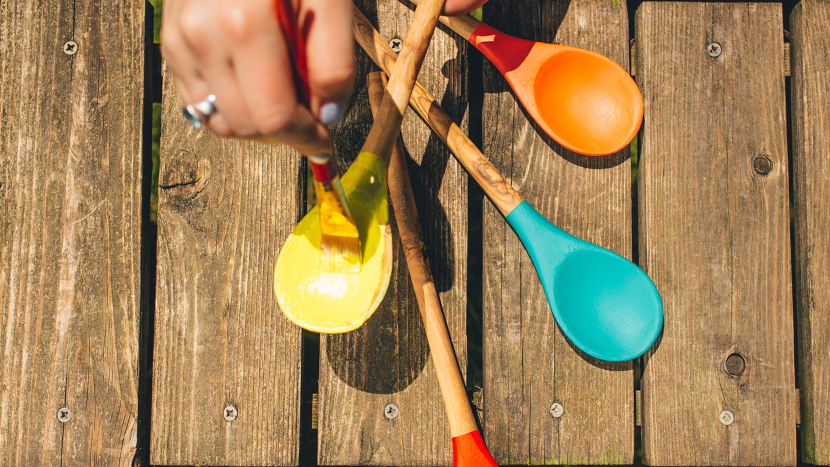 Paint each spoon a different color and write onto spoon names of the herbs you will plant (we love basil, thyme, rosemary and mint!)