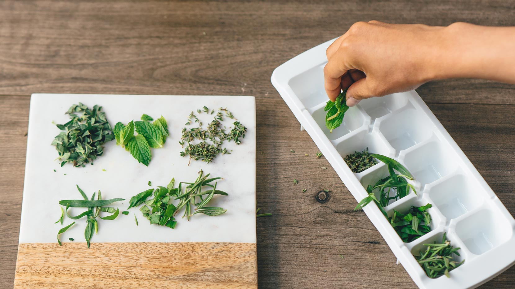 Add herbs to ice cube tray 