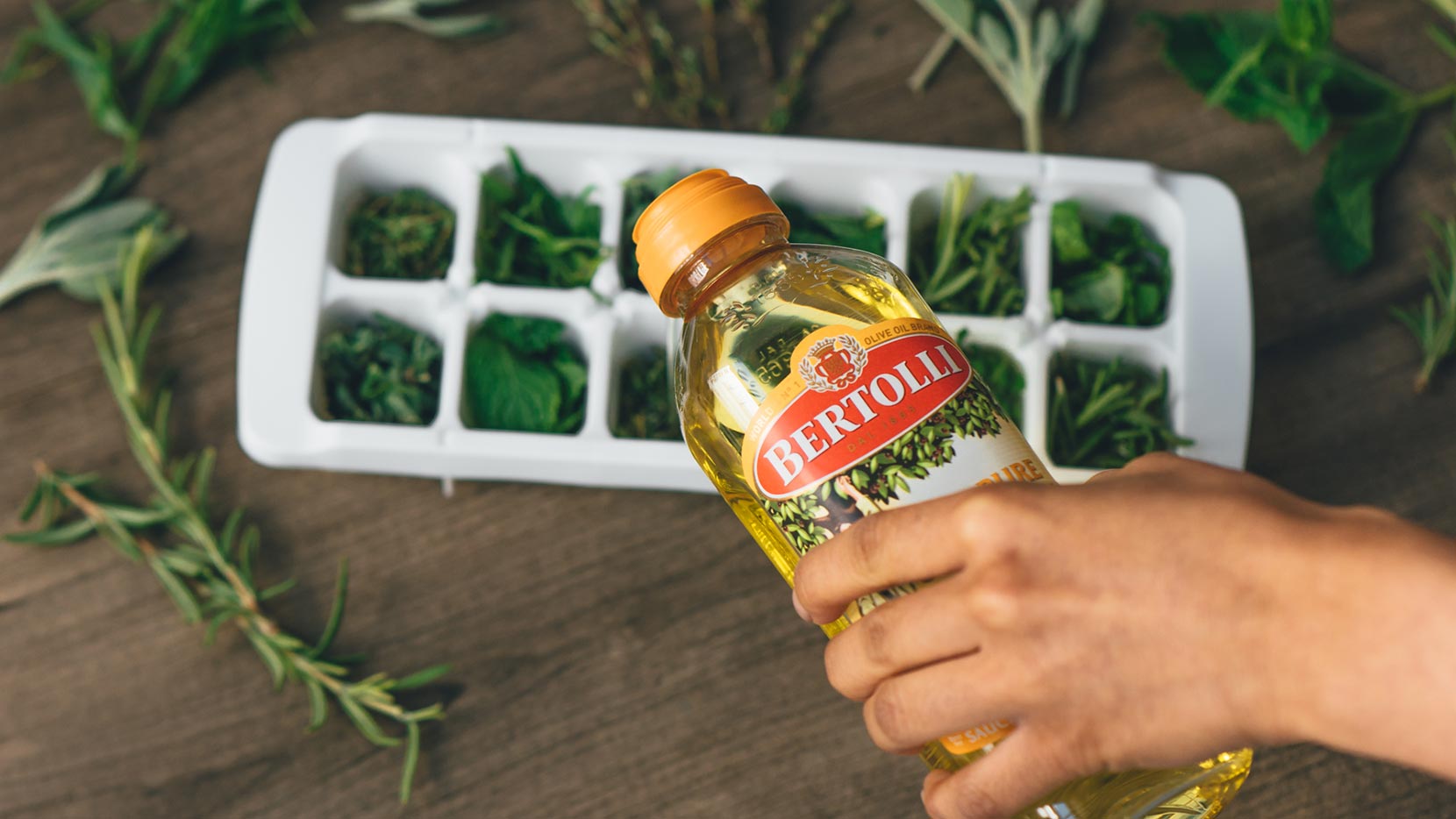 Fill ice cube tray with Bertolli<sup>®</sup> 100% Pure Olive Oil and gently set in freezer to allow them to solidify