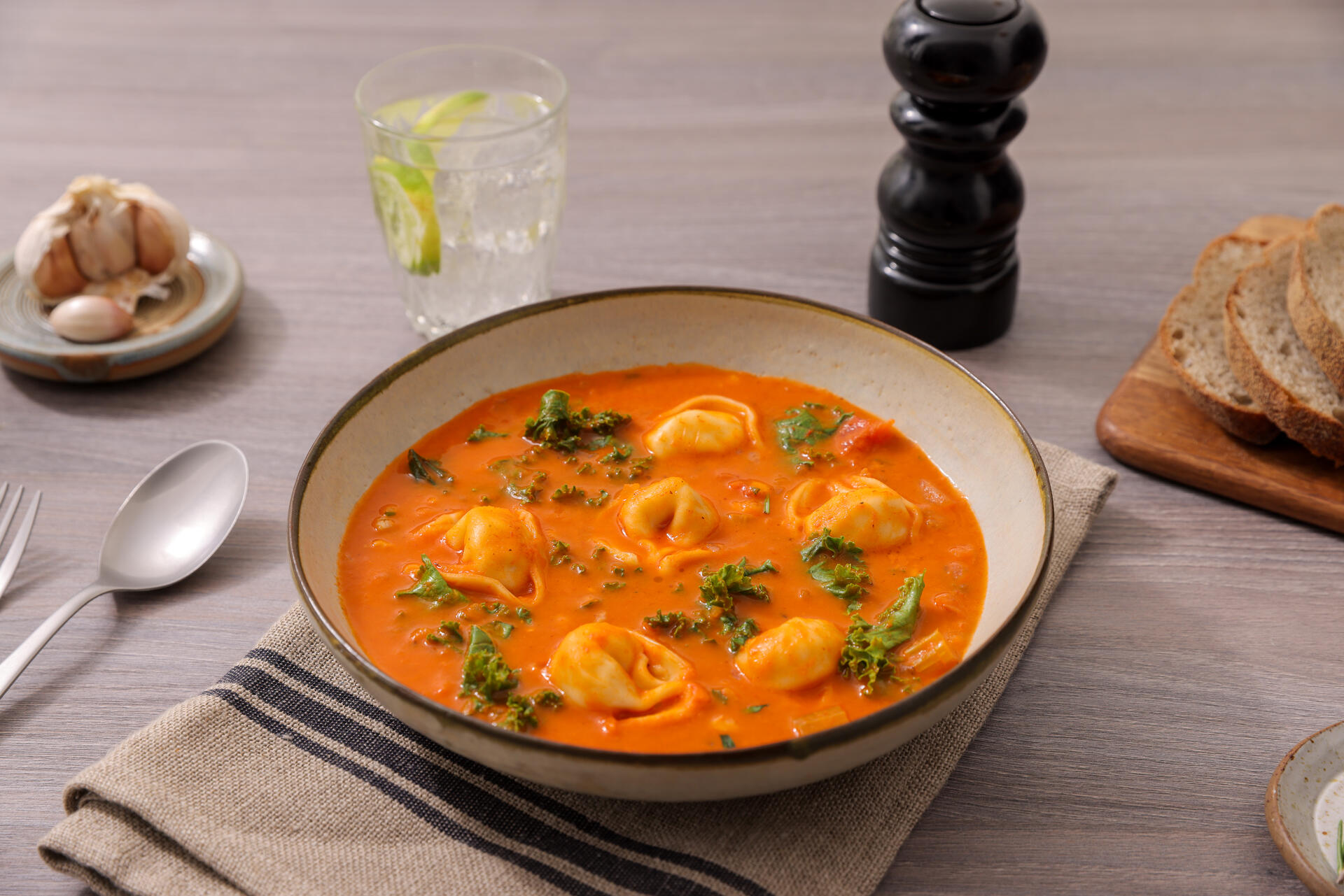 Creamy Tomato Tortellini Soup with Greens